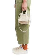 on-model-Beyond-The-Vines-Micro-Dumpling-Crossbody-bag-Cream