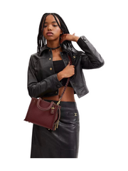 on-model-Coach--Rogue-20-with-Braid-Braided_BrassWine