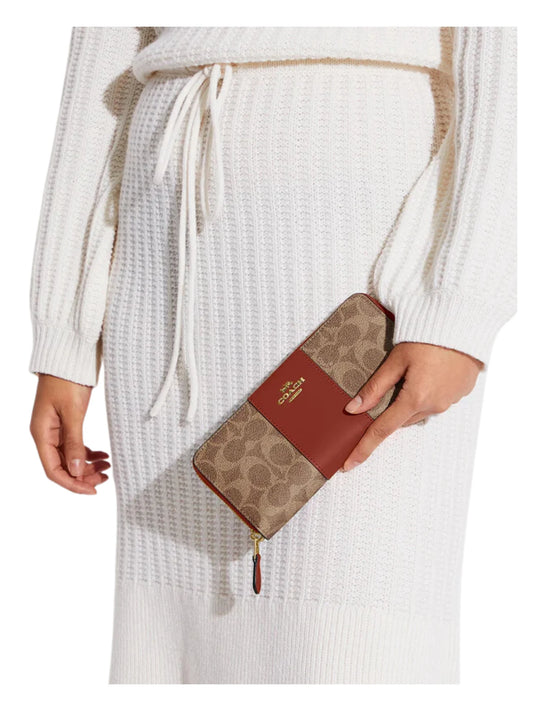 on-model-Coach-Accordion-Zip-Wallet-In-Colorblock-Signature-Canvas-Tan-Rust