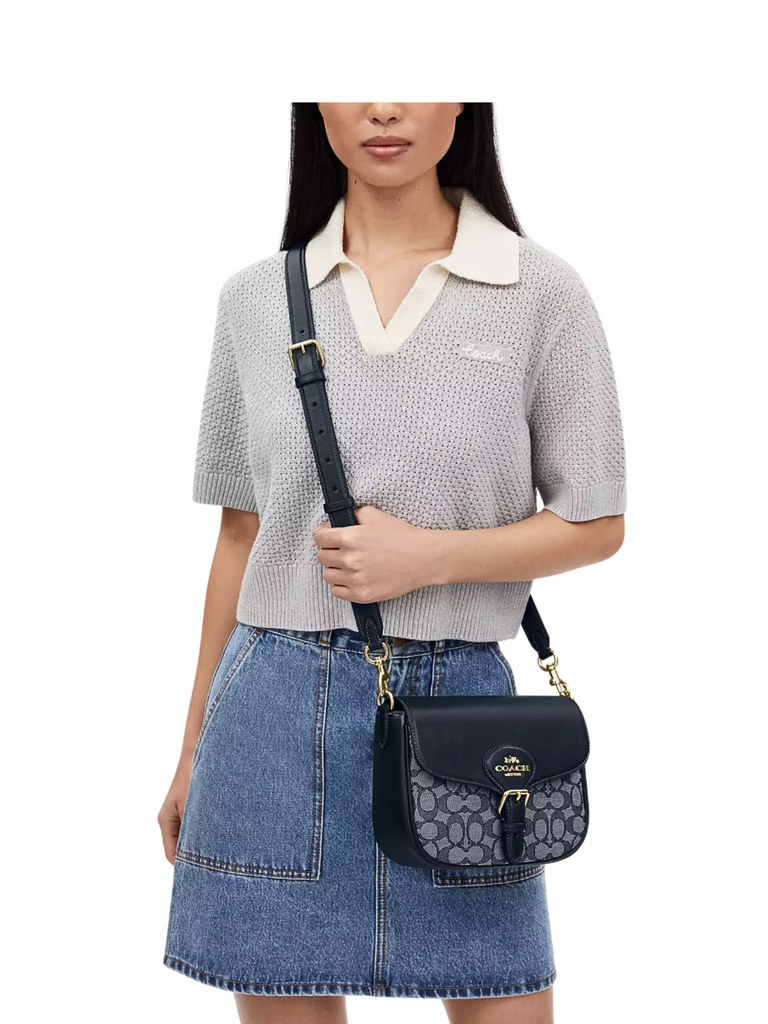 on-model-Coach-Amelia-Saddle-Bag-In-Signature-Jacquard-Midnight-Navy