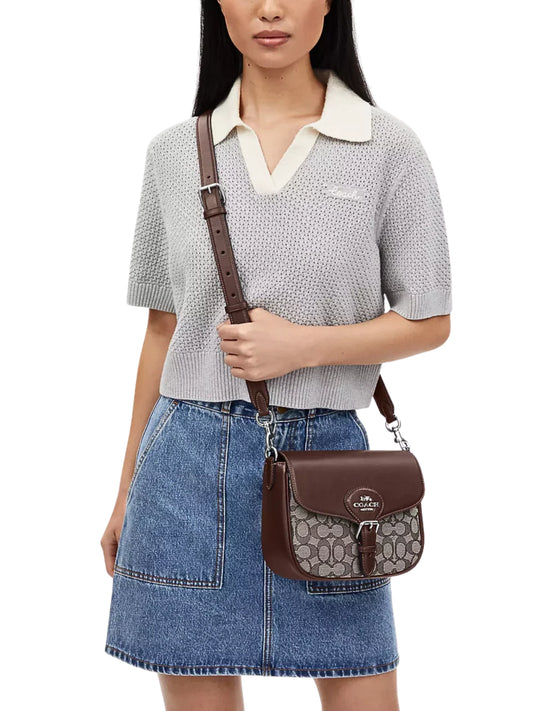 on-model-Coach-Amelia-Saddle-Bag-In-Signature-Jacquard-Oak-Maple