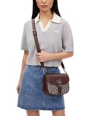 on-model-Coach-Amelia-Saddle-Bag-In-Signature-Jacquard-Oak-Maple