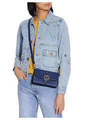on-model-Coach-Beat-Crossbody-Clutch-Pebble-Glovetanned-Leather-Blue
