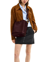 on-model-Coach-Bleecker-Bucket-Bag-Merlot