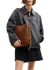 on-model-Coach-Bleecker-Suede-Bucket-Bag-Warm-Brown