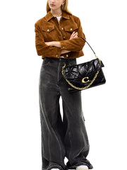 on-model-Coach-Chain-Tabby-Shoulder-Bag-35-With-Quilting-Black