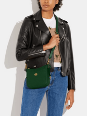 on-model-Coach-Chaise-19-Crossbody-Bag-Dark-Pine
