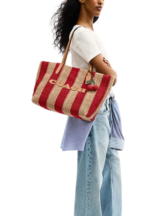 on-model-Coach-City-Tote-Bag-With-Stripes-And-Charm-Red-Tan