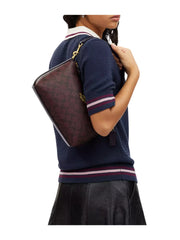 on-model-Coach-Clara-Signature-Shoulder-Bag-Oxblood-MultiWEBP