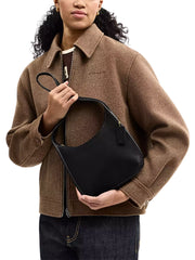 on-model-Coach-Curve-Zip-Bag-Black