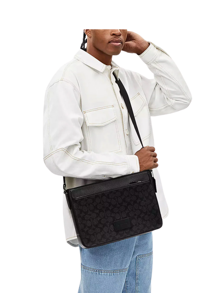 on-model-Coach-District-Crossbody-Bag-In-Signature-Canvas-Charcoal-Black