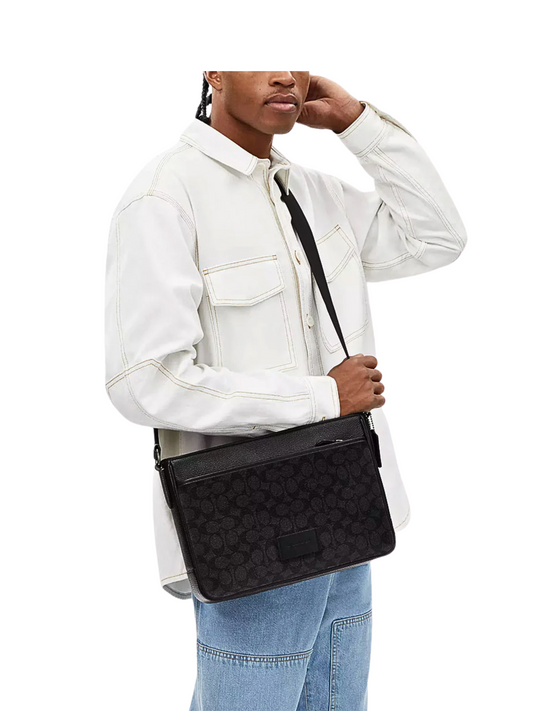 on-model-Coach-District-Crossbody-Bag-In-Signature-Canvas-Charcoal-Black