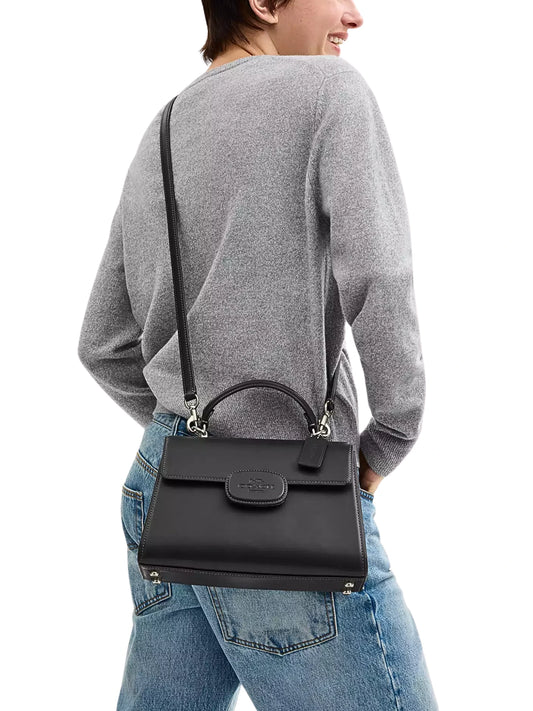 on-model-Coach-Eliza-Top-Handle-Bag-Black