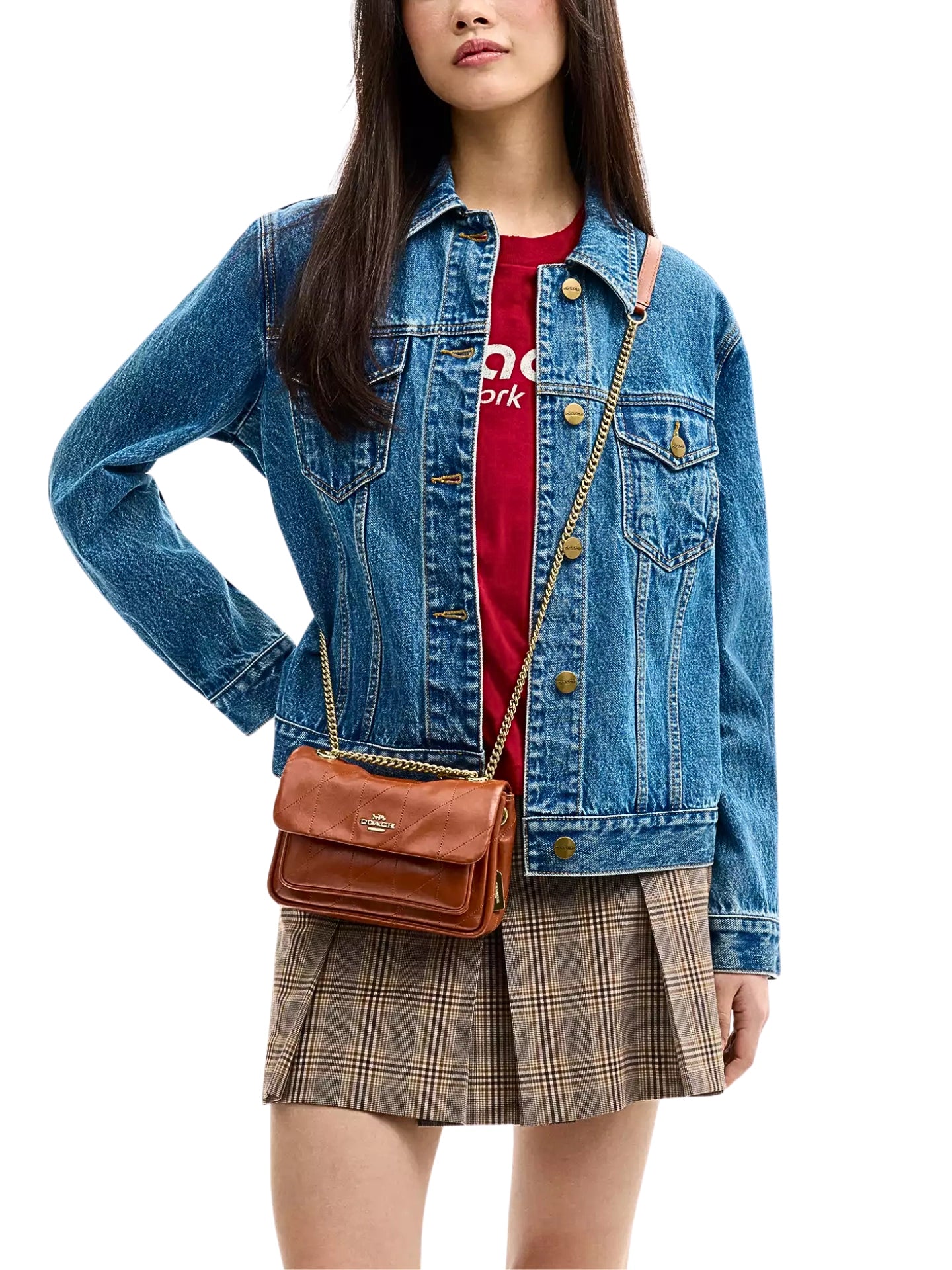 on-model-Coach-Elodie-Crossbody-Bag-18-With-Quilting-Cinnamon