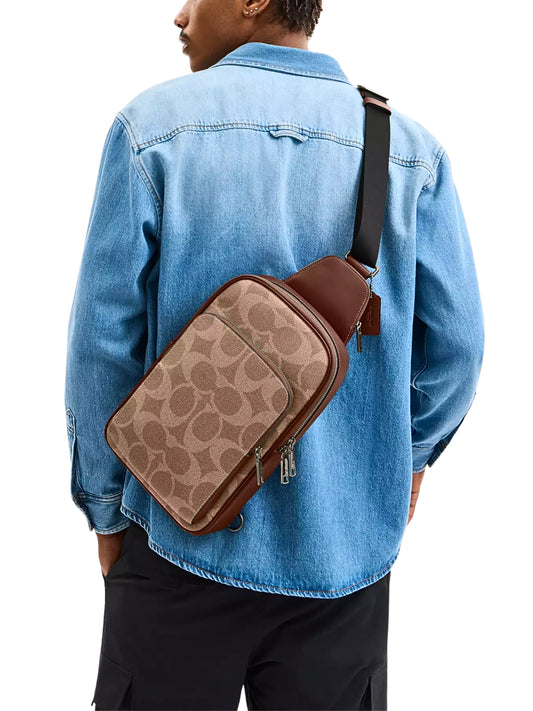 on-model-Coach-Ethan-Pack-In-Signature-Canvas-Tan-Vintage-Brown