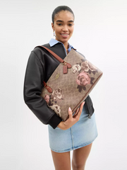 on-model-Coach-Gallery-Tote-Bag-In-Signature-Canvas-With-Rose-Print-Gold-Tan-Multi