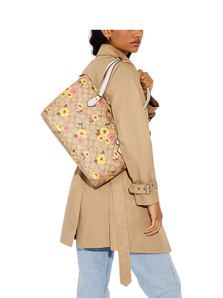 on-model-Coach-Gallery-Tote-In-Signature-Canvas-With-Floral-Print-Light-Khaki-Multi