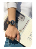 on-model-Coach-Grand-Watch-36mm-Black-Leather-_Band