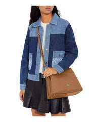 on-model-Coach-Hanna-Leather-In-Shoulder-Bag-Light-SaddleWEBP