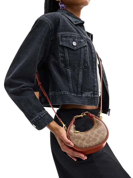 on-model-Coach-Jonie-Bag-In-Signature-Canvas-Tan-Rust