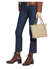 on-model-Coach-Kacey-Satchel-in-Signature-Canvas-with-Snake-Embossed-Light-KhakiIvory-Multi