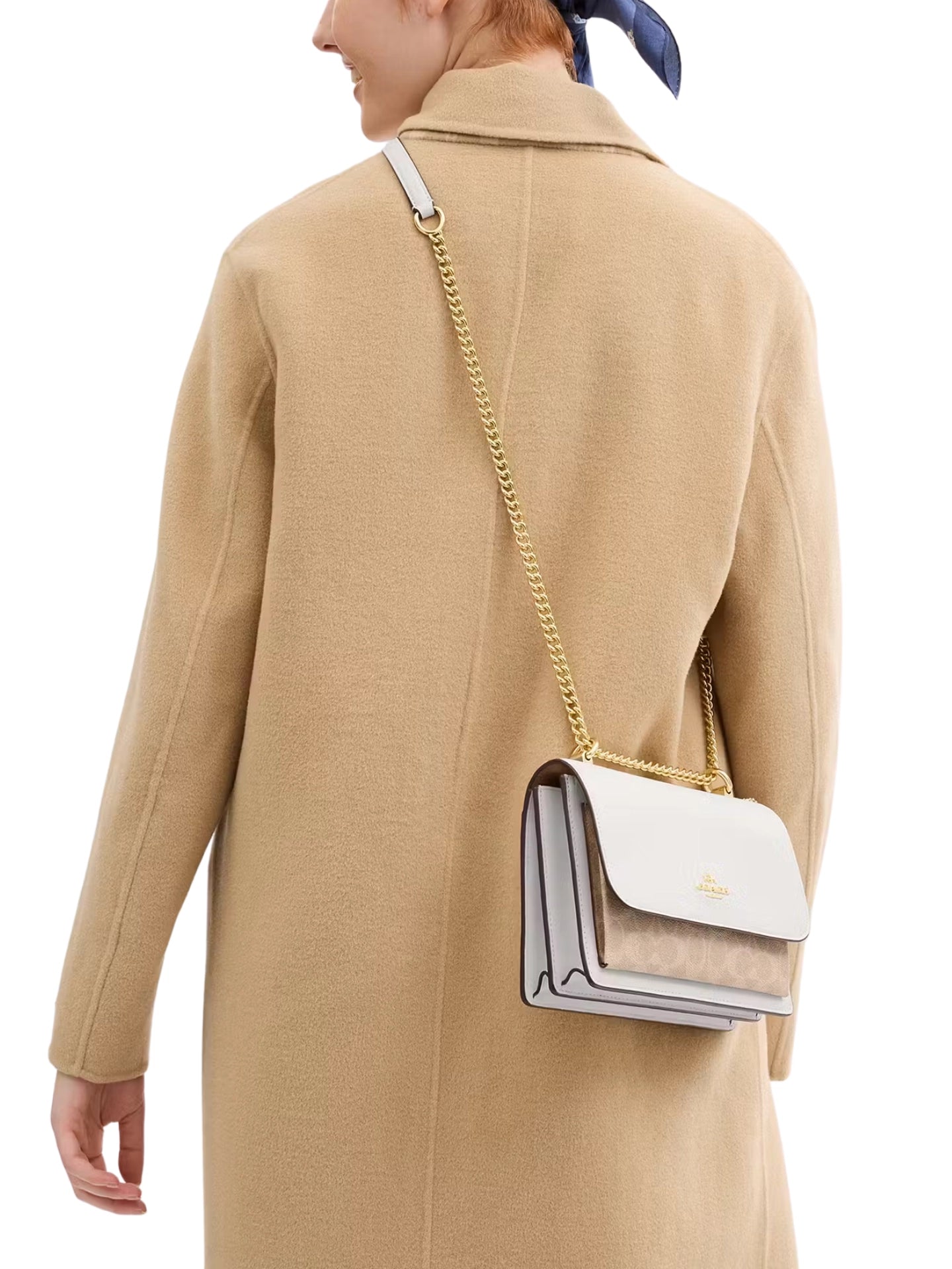 on-model-Coach-Klare-Crossbody-Bag-In-Signature-Canvas-Sand-Chalk