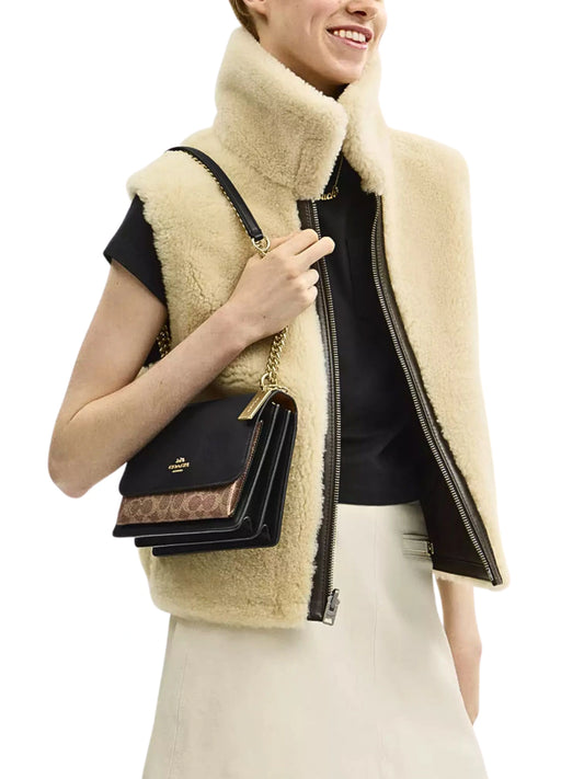 on-model-Coach-Klare-Crossbody-Bag-In-Signature-Canvas-Tan-Black-Multi