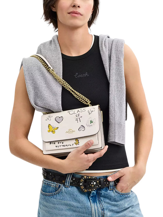 on-model-Coach-Klare-Crossbody-Bag-With-Sketch-Print-Chalk-Multi