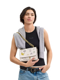 on-model-Coach-Klare-Crossbody-Bag-With-Sketch-Print-Chalk-Multi