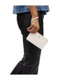 on-model-Coach-Large-Corner-Zip-Wristlet-Chalk