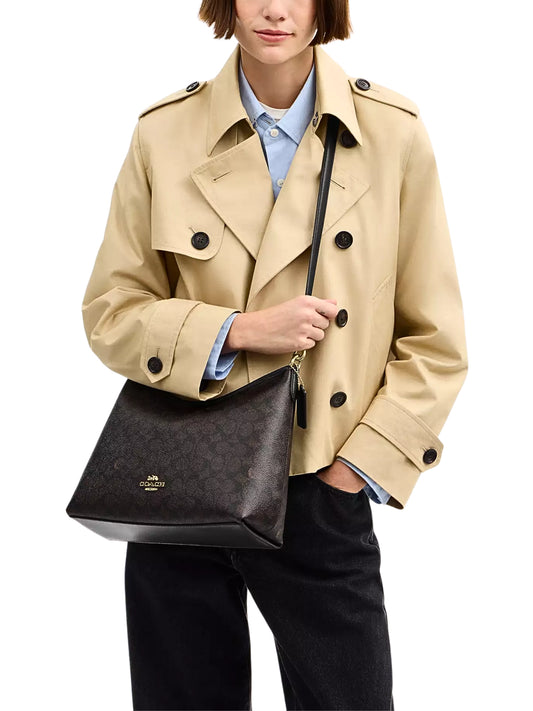 on-model-Coach-Laurel-Shoulder-Bag-In-Signature-Canvas-Walnut-Black