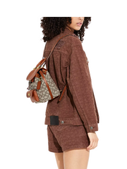 on-model-Coach-Leah-Backpack-21-In-Signature-Textile-Jacquard-Cocoa-Burnished-Amber