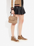 on-model-Coach-Marlie-Top-Handle-Satchel-With-Border-Quilting-Tauped