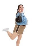 on-model-Coach-Mini-Bucket-Bag-In-Signature-Canvas-Walnut-Black