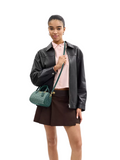on-model-Coach-Mini-Rowan-Crossbody-Bag-In-Blocked-Signature-Leather-Sage-Dark-Turquoise