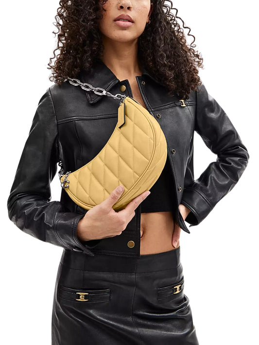 on-model-Coach-Mira-Shoulder-Bag-With-Pillow-Quilting-Hay