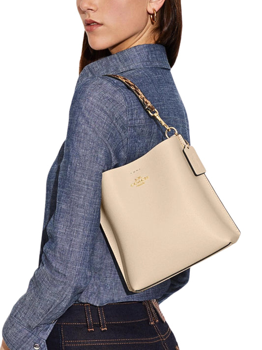 on-model-Coach-Mollie-Bucket-Bag-22-Snake-Embossed-Leather-Ivory-Multi