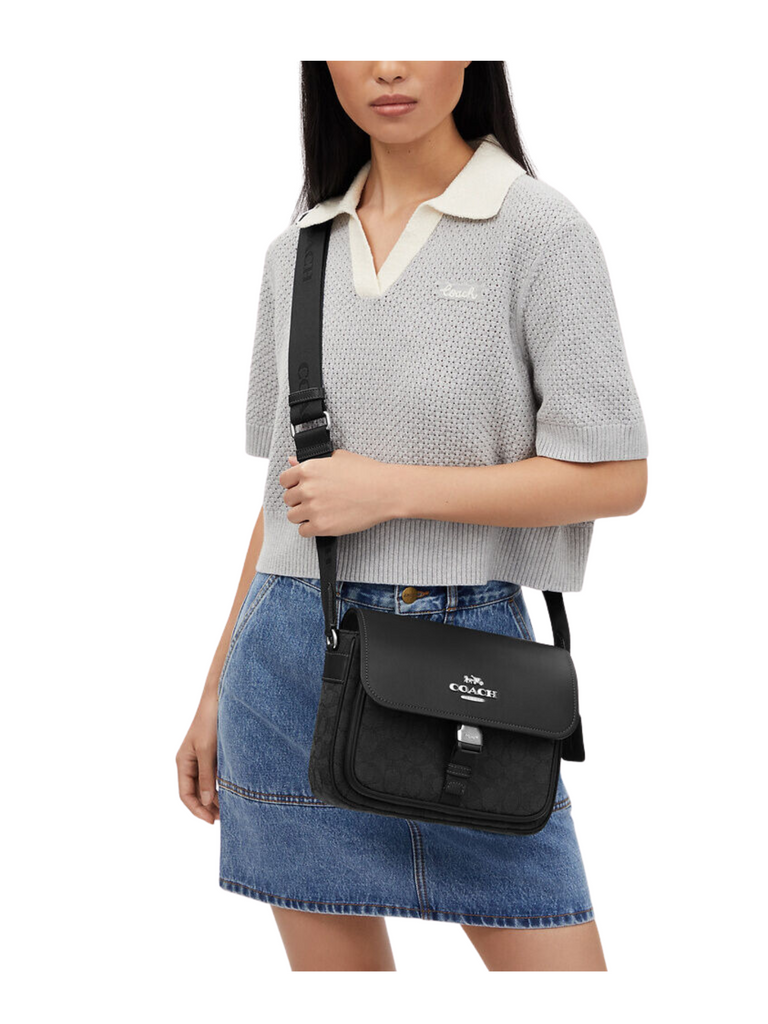 on-model-Coach-Pace-Messenger-Bag-In-Signature-Canvas-Black