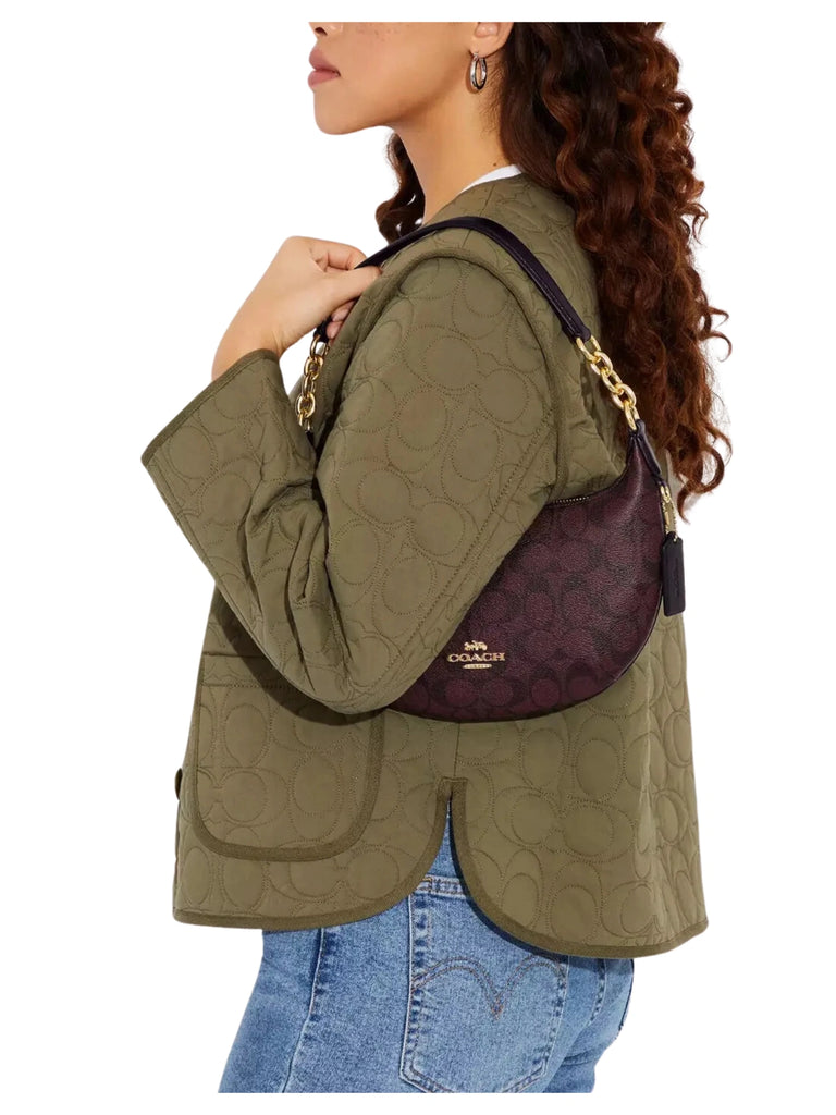 on-model-Coach-Payton-Hobo-Bag-In-Signature-Canvas-Oxblood-Multi