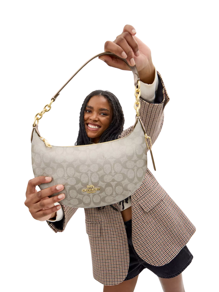on-model-Coach-Payton-Hobo-In-Signature-Metallic-Canvas-Champagne-Multi