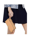 on-model-Coach-Pebbled-Leather-Double-Zip-Wallet-In-LatteWEBP