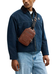 on-model-Coach-Racer-Sling-Pack-In-Signature-Leather-Vintage-Brown