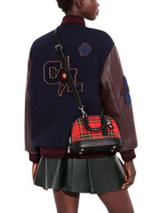 on-model-Coach-Revel-Bag-24-With-Plaid-Print-Sport-Red-Multi