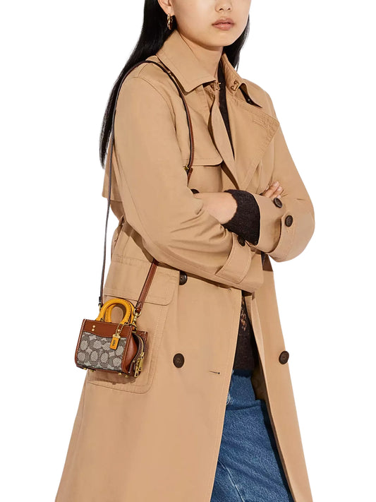 on-model-Coach-Rogue-12-Cocoa-Burnished-Amber