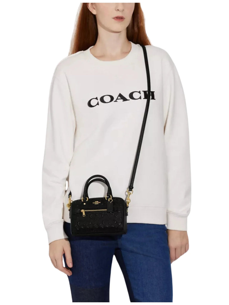 on-model-Coach-Rowan-Mini-Leather-In-Signature-Crossbody-Bag-Black