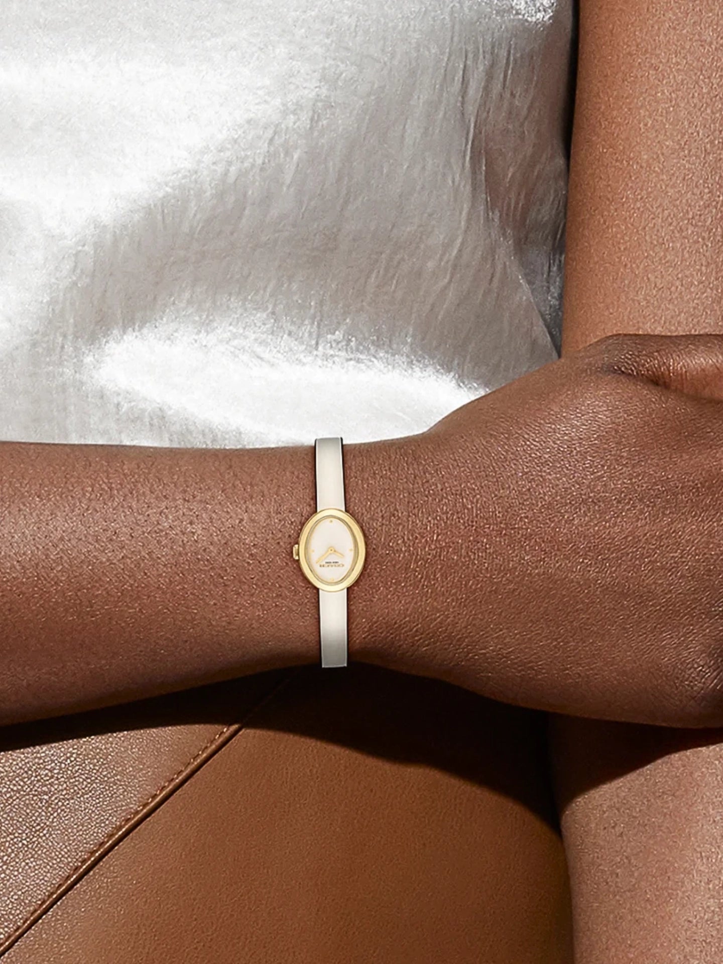 on-model-Coach-Sammy-Quartz-Gold-Case-Chalk-Leather-Strap-Watch