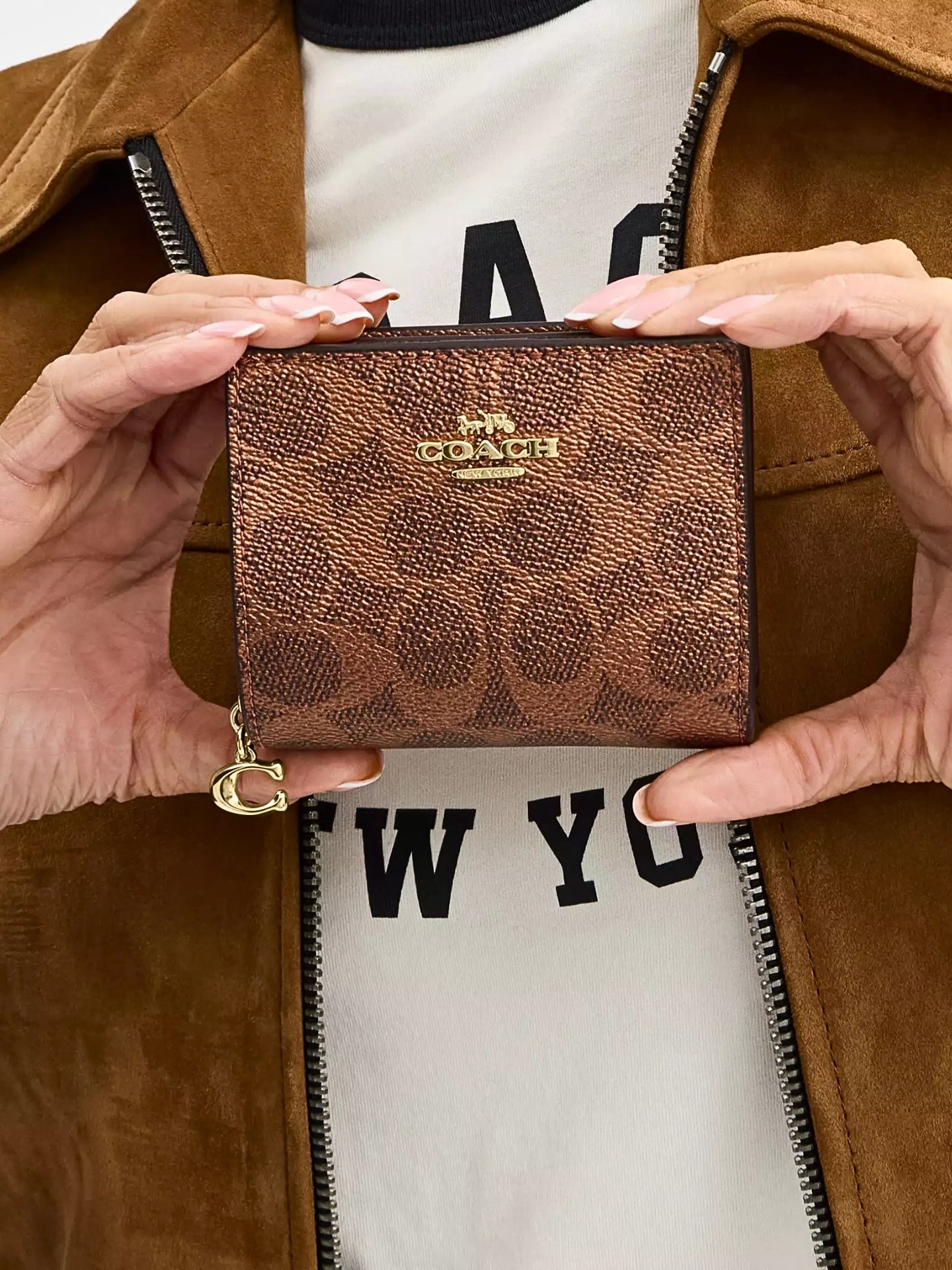 on-model-Coach-Snap-Wallet-In-Signature-Metallic-Crossgrain-Leather-Brown-Copper