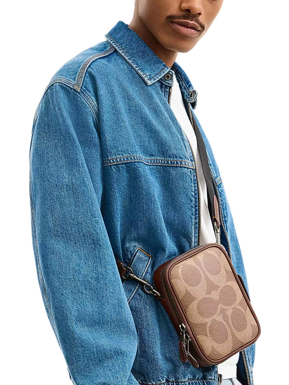 on-model-Coach-Stanton-Crossbody-Bag-In-Signature-Canvas-Tan-Vintage-Brown