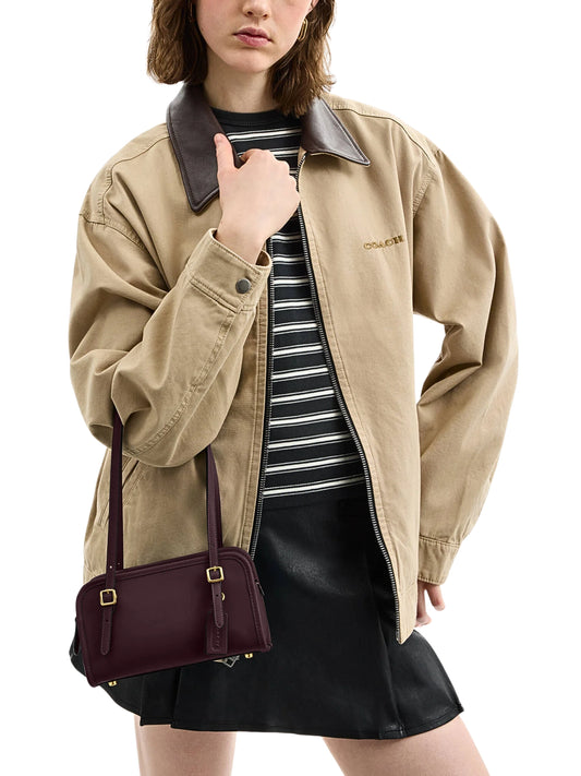 on-model-Coach-Swing-Zip-Bag-20-Blackcurrent