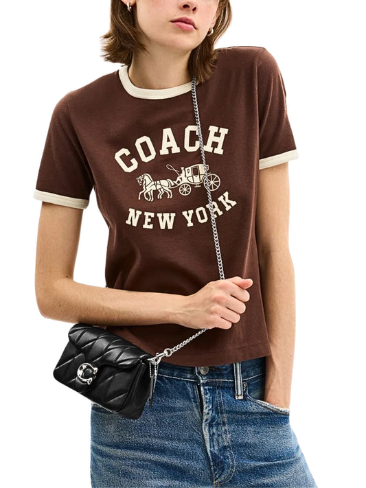 on-model-Coach-Tabby-Chain-Crossbody-Bag-19_-With-Quilting-Black